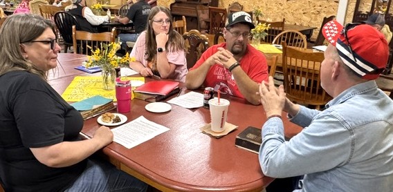 Adults participating in a Next Steps class at Cowboy Church